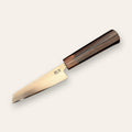 Couteau Office Forge Tay, finition inox, fond crème